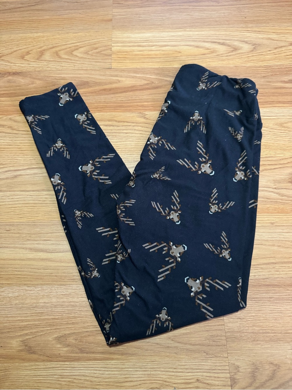 LuLaRoe Black Leggings with Brown Deer Head Print